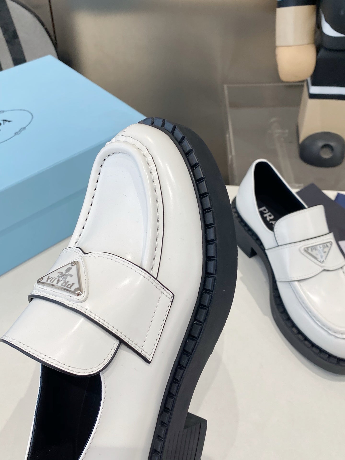PRADA 26S LOAFERS IN WHITE CALFSKIN WITH LOGO