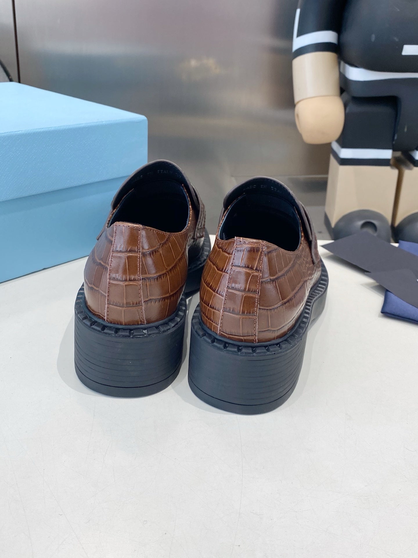 PRADA 26S LOAFERS IN DARK BROWN CROCODILE PRINT CALFSKIN