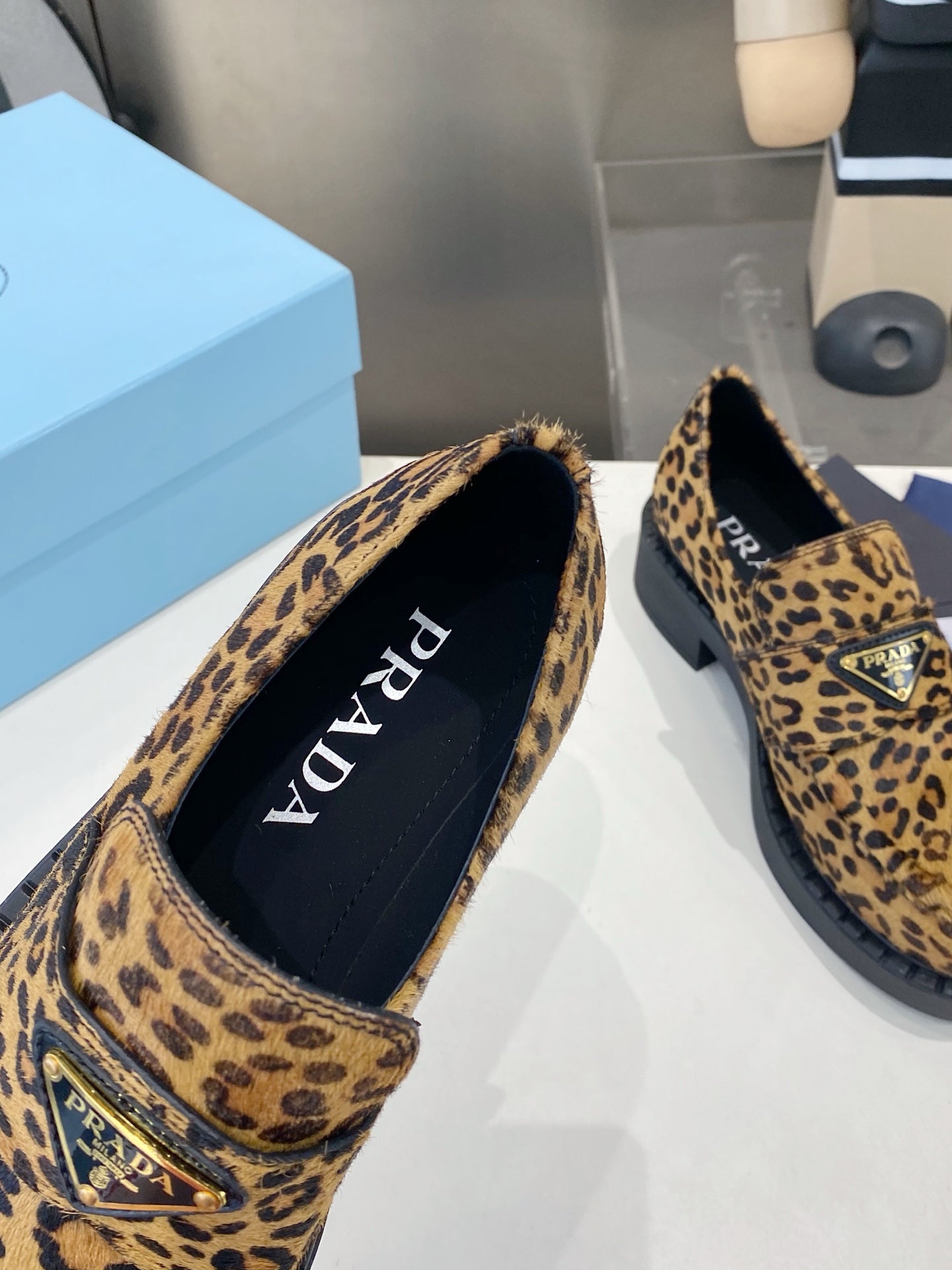 PRADA 26S LOAFERS IN BROWN LEOPARD PRINT PONY HAIR