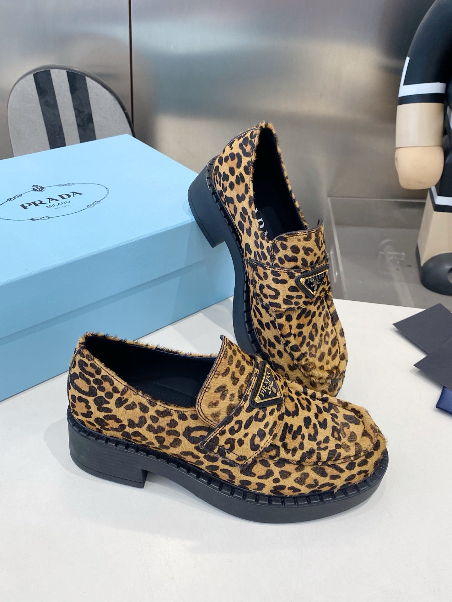 PRADA 26S LOAFERS IN BROWN LEOPARD PRINT PONY HAIR