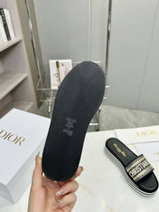CD DWAY PLATFORM SLIDE IN BLACK AND WHITE COTTON STRIPED SOLE