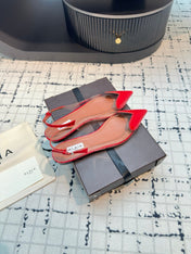 ALAIA FLAT SLINGBACK IN CHERRY RED PATENT CALFSKIN AND FILM