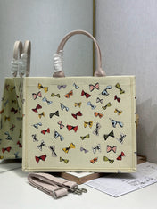 DIOR 26S LARGE BOOK TOTE 42 BEIGE WHITE BOW PRINT WOVEN FABRIC