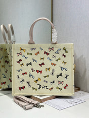 DIOR 26S LARGE BOOK TOTE 42 BEIGE WHITE BOW PRINT WOVEN FABRIC