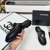 CHANEL 25S MULES WITH CHAIN DETAIL IN BLACK GLOSSY CALFSKIN GOLD HARDWARE