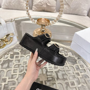 POLLY WEDGE MULE IN BLACK SHINY CALFSKIN