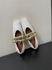 ALAIA BALLET FLATS IN WHITE GLOSSY CALFSKIN WITH GOLD HARDWARE