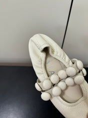 ALAIA SPHERE BALLET FLATS IN WHITE LAMBSKIN