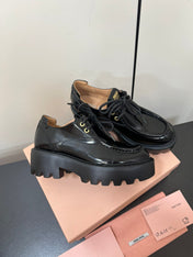 LACE-UP LOAFERS WITH THICK SOLE IN BLACK SHINY SHEEPSKIN