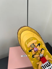 TYRE SNEAKERS IN YELLOW TECHNICAL FABRIC AND SUEDE WITH STICKER