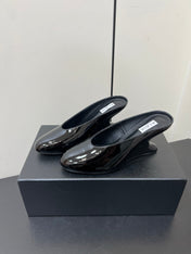 ALAIA WEDGE MULES 25S IN BLACK LAMBSKIN