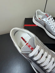 PRADA 26S SNEAKERS IN SILVER CALFSKIN AND WHITE MESH