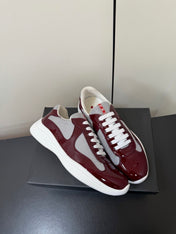 PRADA 26S SNEAKERS IN BURGUNDY RED PATENT CALFSKIN AND WHITE MESH