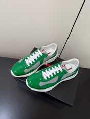PRADA 26S SNEAKERS IN GREEN PATENT CALFSKIN AND WHITE MESH