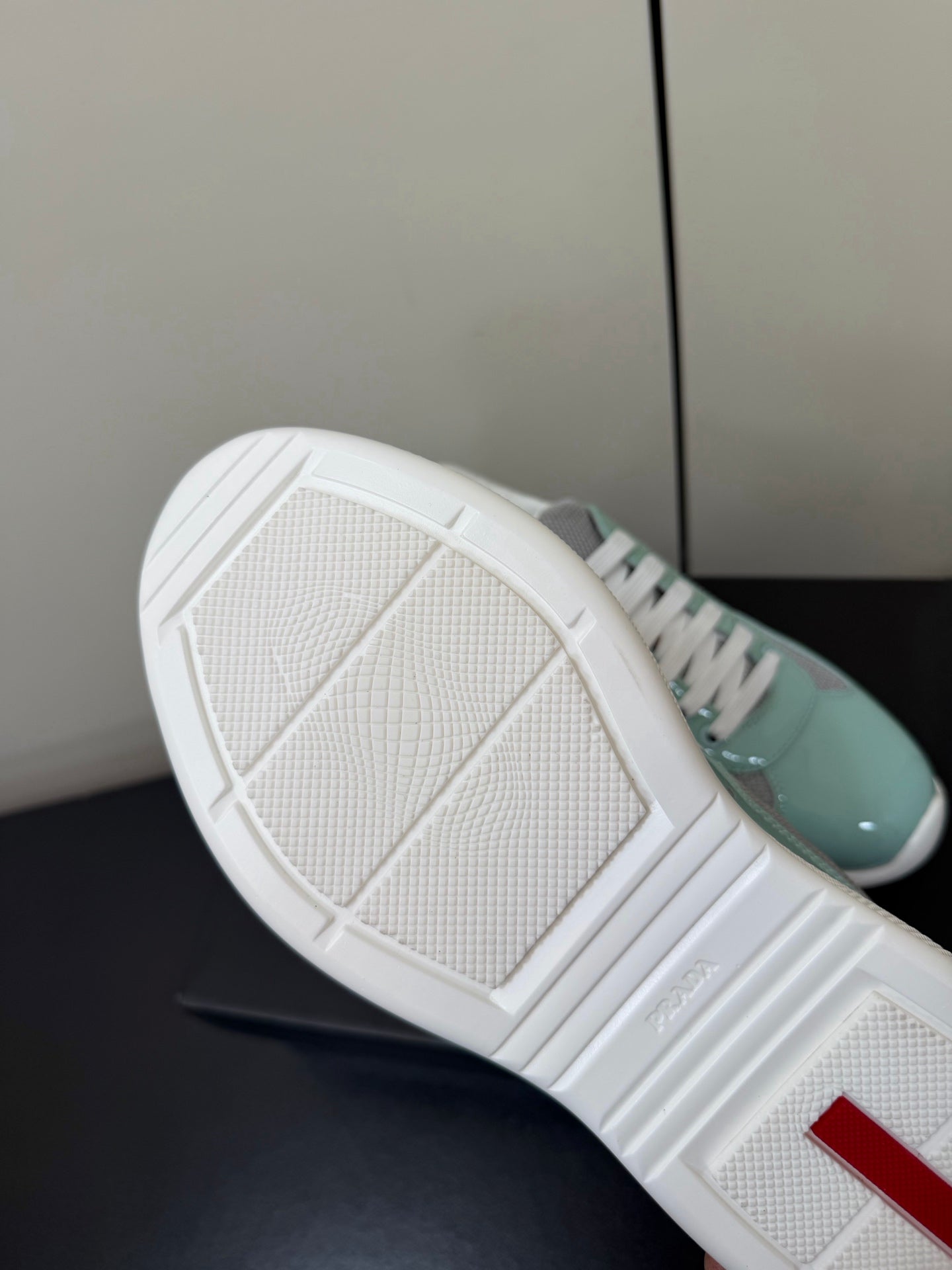 PRADA 26S SNEAKERS IN SOFT TEAL PATENT CALFSKIN AND WHITE MESH