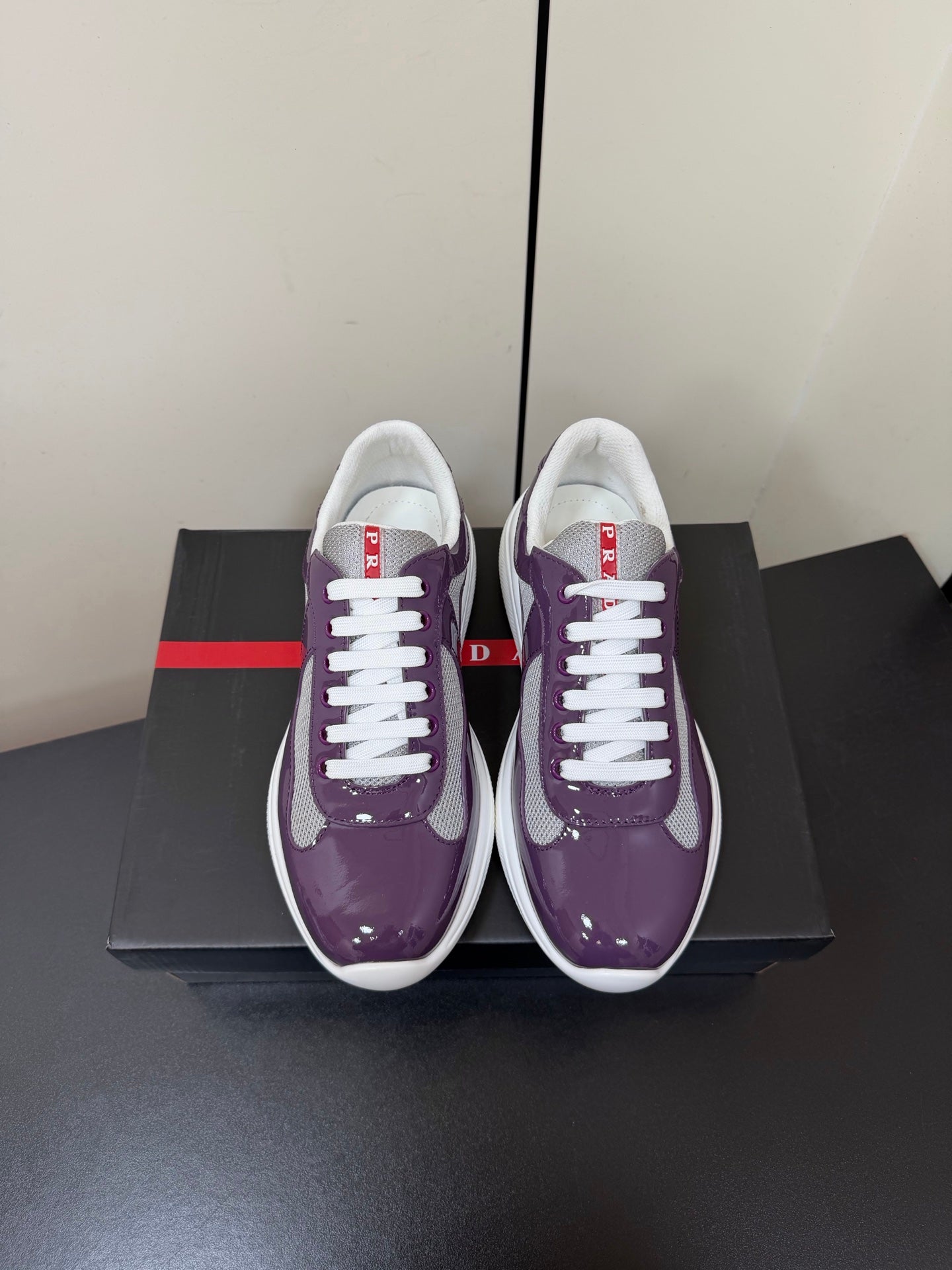 PRADA 26S SNEAKERS IN PLUM PURPLE PATENT CALFSKIN AND WHITE MESH