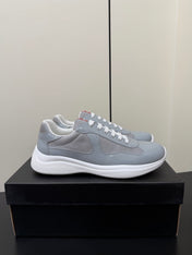 PRADA 26S SNEAKERS IN LIGHT GRAY PATENT CALFSKIN AND WHITE MESH