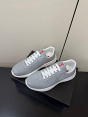 PRADA 26S SNEAKERS IN LIGHT GRAY PATENT CALFSKIN AND WHITE MESH