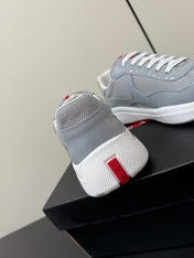 PRADA 26S SNEAKERS IN LIGHT GRAY PATENT CALFSKIN AND WHITE MESH
