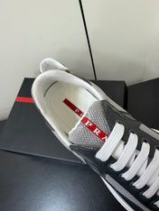 PRADA 26S SNEAKERS IN GRAY PATENT CALFSKIN AND WHITE MESH