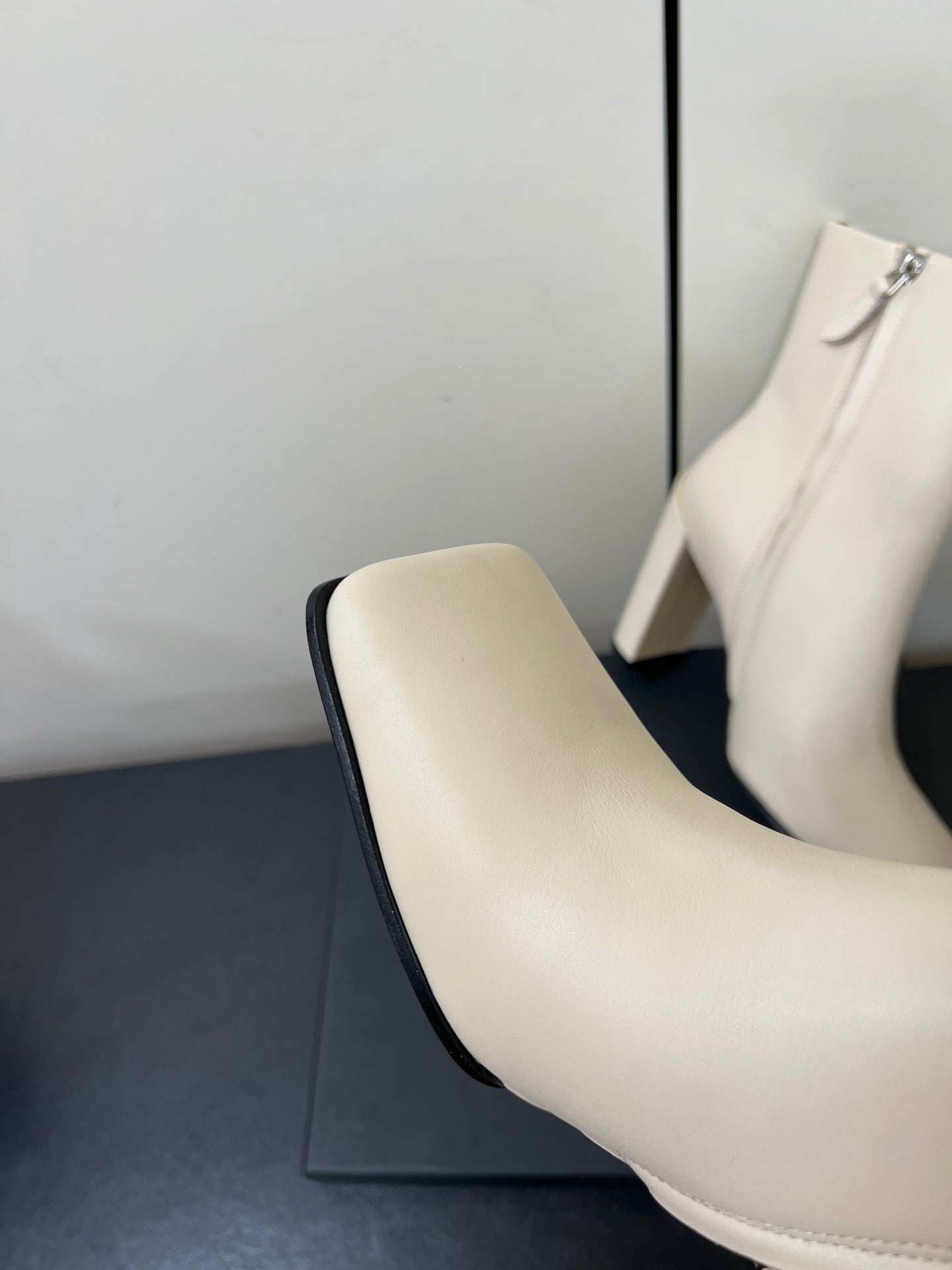 ALAIA 26S SQUARE-TOE BOOTS IN WHITE CALFSKIN