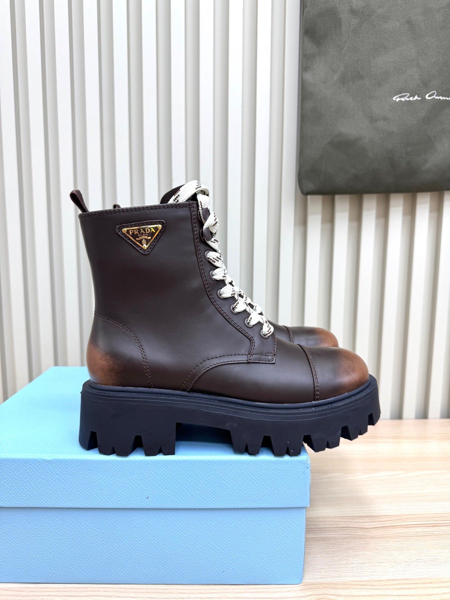 PRADA 25S MONOLITH BOOTS IN DARK BROWN CALFSKIN