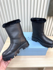PRADA 25S MARTIN BOOTS IN BLACK CALFSKIN FUR-LINED
