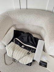 CHANEL 26S DRAWSTRING BACKPACK 44 IN BLACK AND WHITE NYLON GOLD HARDWARE