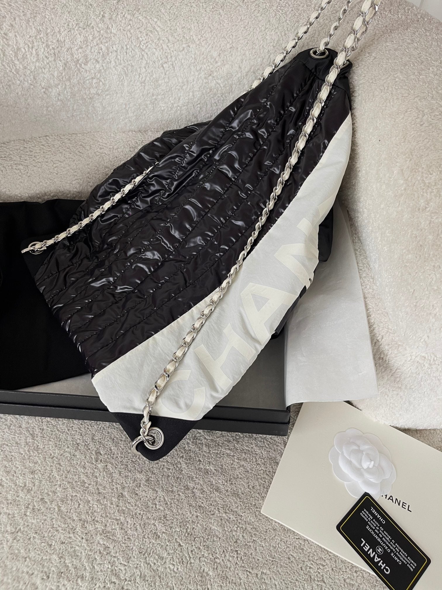 CHANEL 26S DRAWSTRING BACKPACK 44 IN BLACK AND WHITE NYLON GOLD HARDWARE