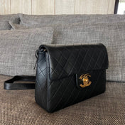 CHANEL 26S QUILTED FLAP BACKPACK 28 IN BLACK LAMBSKIN GOLD HARDWARE
