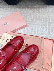 BOW MARY JANE FLAT IN RED NAPLAK LAMBSKIN