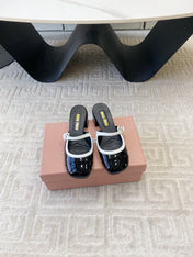 MARY JANE MULE PUMPS IN BLACK GLOSSY SHEEPSKIN