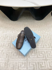 TASSEL MULES IN WALNUT BROWN LAMBSKIN