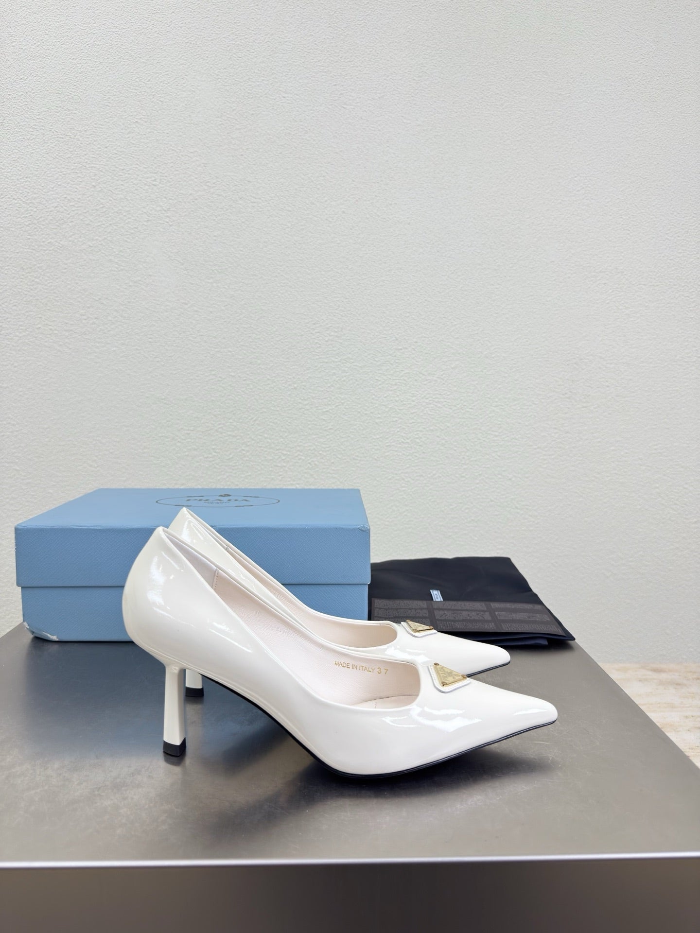 PRADA 26S POINTED TOE PUMPS 75MM IN WHITE PATENT CALFSKIN