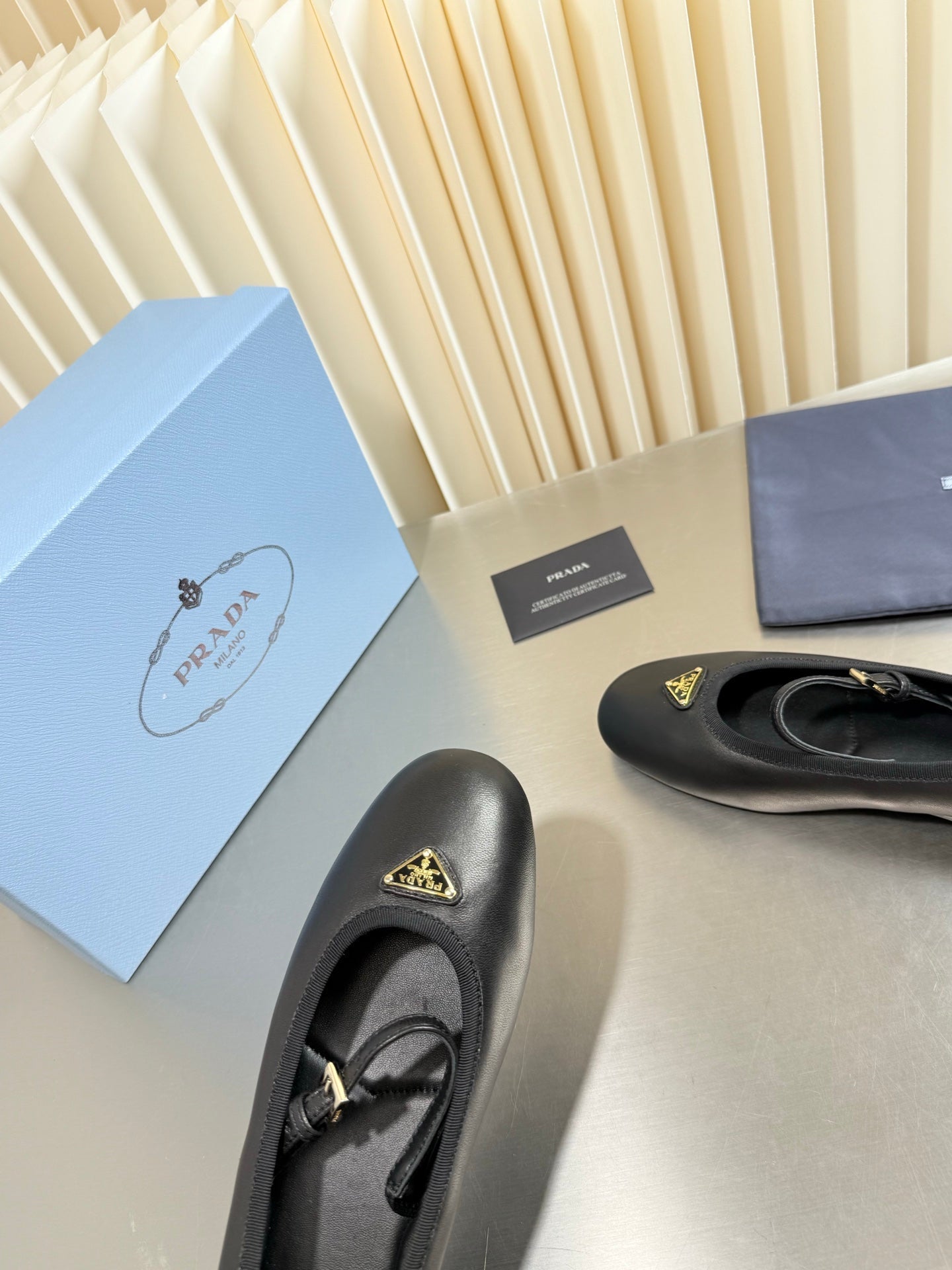 PRADA 26S MARY JANE FLATS IN BLACK CALFSKIN