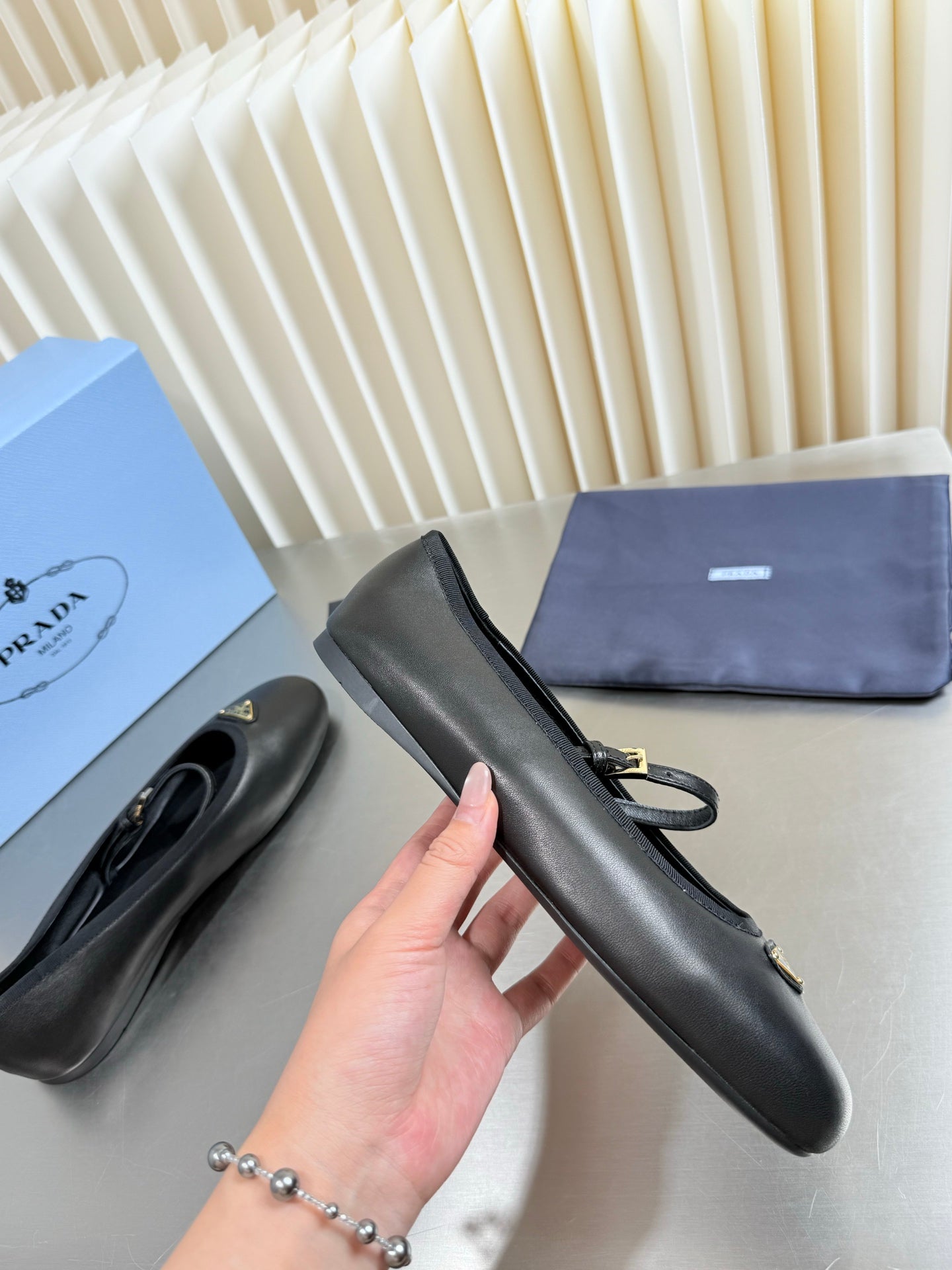 PRADA 26S MARY JANE FLATS IN BLACK CALFSKIN
