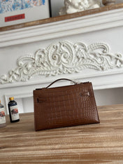HM 26S KELLY MINI 22MM IN DARK BROWN CROC EMBOSSED CALFSKIN SILVER KELLY BUCKLE