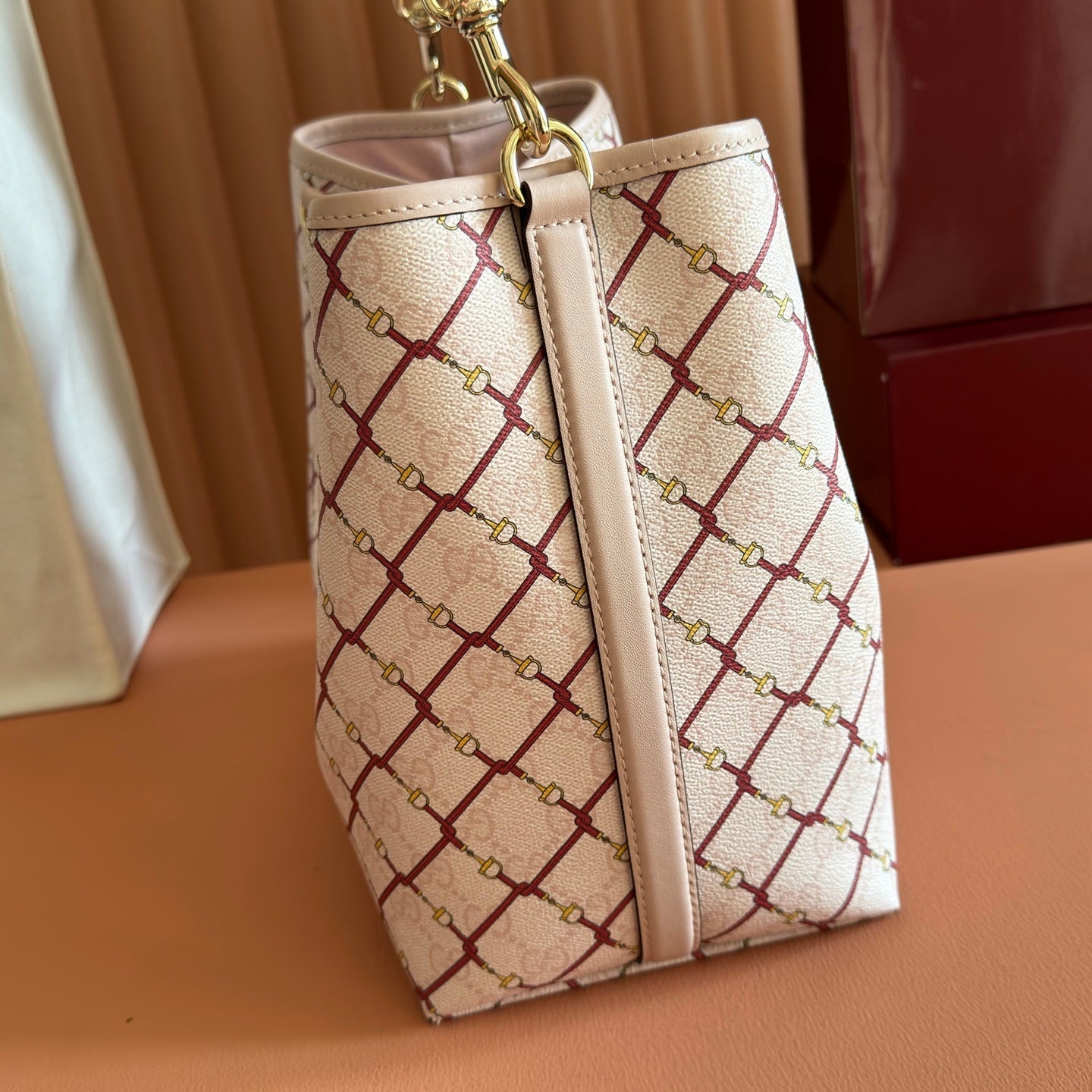 GUCCI 26S GG EMBLEM BUCKET BAG 25 IN LIGHT PINK COATED FABRIC