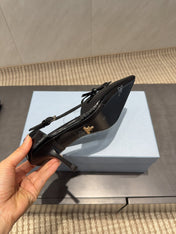 PRADA 26S POINTED TOE CUT OUT HIGH HEELS 75MM IN BLACK CALFSKIN WITH BOW