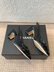 MID-HEEL SLINGBACKS IN BLACK PATENT CALFSKIN