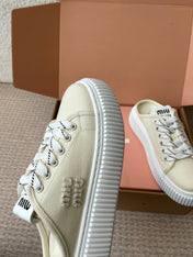 WASH SNEAKER MULES IN OFF WHITE DENIM WHITE STRIPED LACES