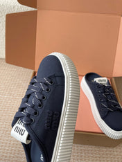 WASH SNEAKER MULES IN DARK NAVY DENIM