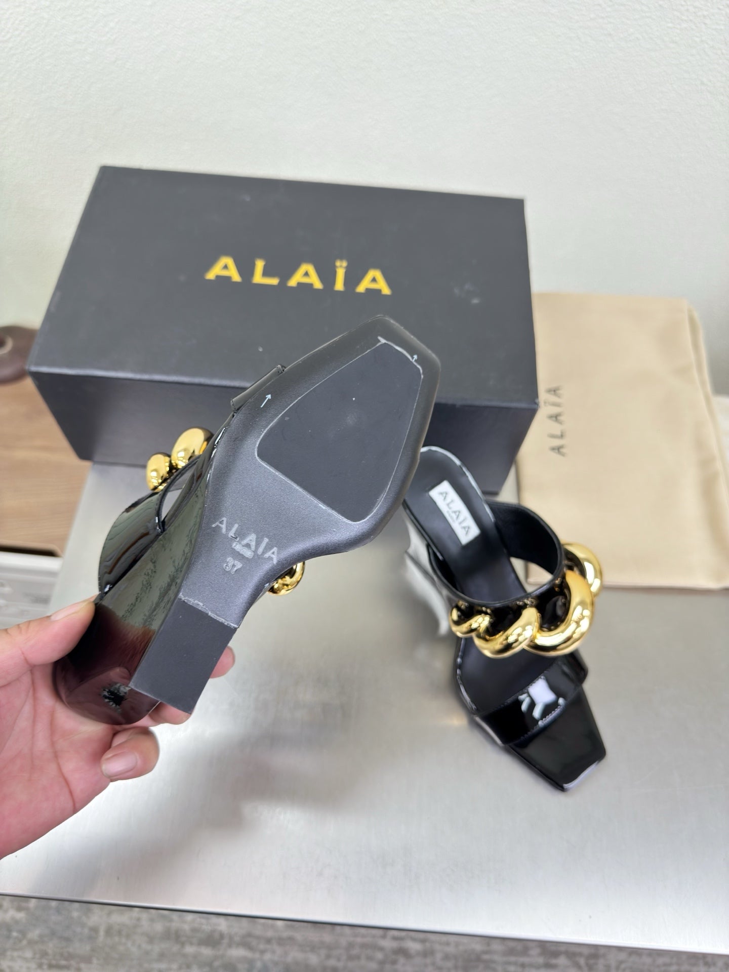 ALAIA 26S DOUBLE STRAP WEDGE SANDALS 110 MM IN BLACK GLOSSY CALFSKIN WITH GOLD HARDWARE