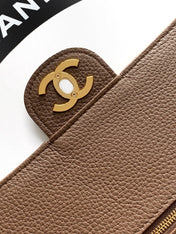 CHANEL 26S SOUPLISSIMO MAXI FLAP 39 IN BROWN GRAINED CALFSKIN GOLD HARDWARE