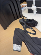 HIGH 12 CM PLATFORM SANDALS IN BLACK SUEDE