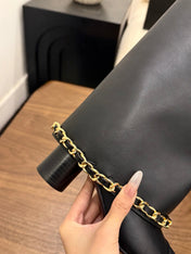 CHANEL 26S TALL BOOTS 60 MM IN BLACK CALFSKIN TALL BOOTS WITH GOLD TONE CHAIN DETAIL