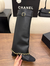 CHANEL 26S TALL BOOTS 60 MM IN BLACK CALFSKIN TALL BOOTS WITH GOLD TONE CHAIN DETAIL