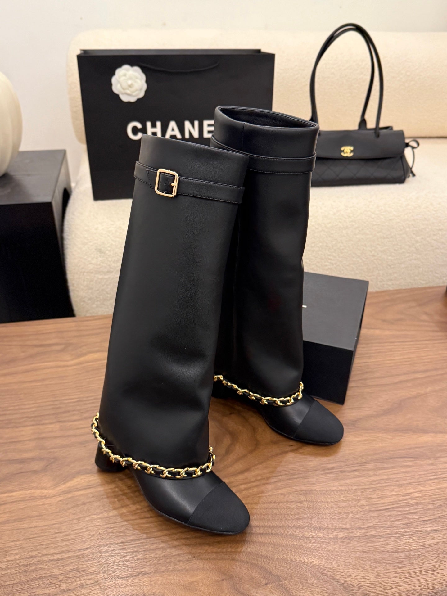 CHANEL 26S TALL BOOTS 60 MM IN BLACK CALFSKIN TALL BOOTS WITH GOLD TONE CHAIN DETAIL