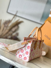 ONTHEGO EAST WEST 25 IN CORAL MONOGRAM TILES CANVAS