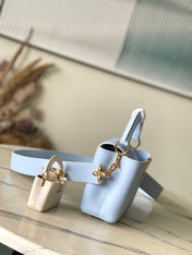 CAPUCINES MINI 21 IN CANDY BLUE TAURILLON GOLD HARDWARE